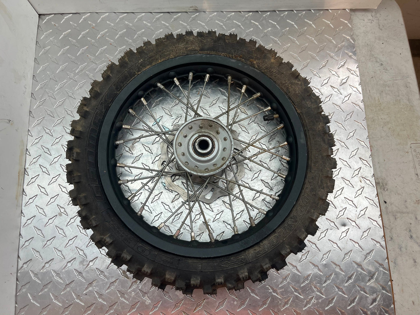 OEM KTM 50 SX FRONT WHEEL PART# 45309001044 STRAIGHT NO BENDS OR CRACKS