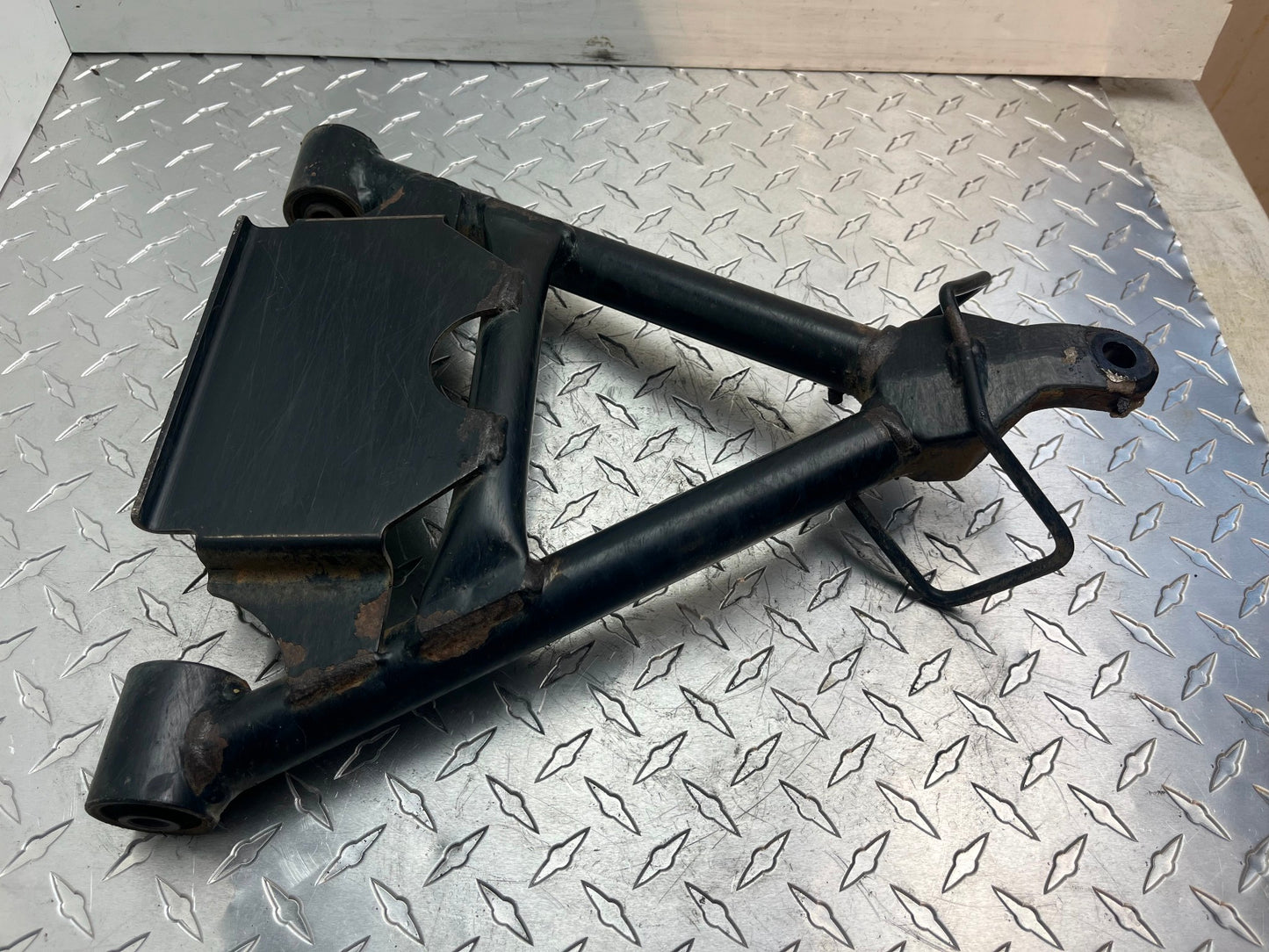 OEM KAWASAKI MULE FRONT CONTROL ARM PART# 39002-0001