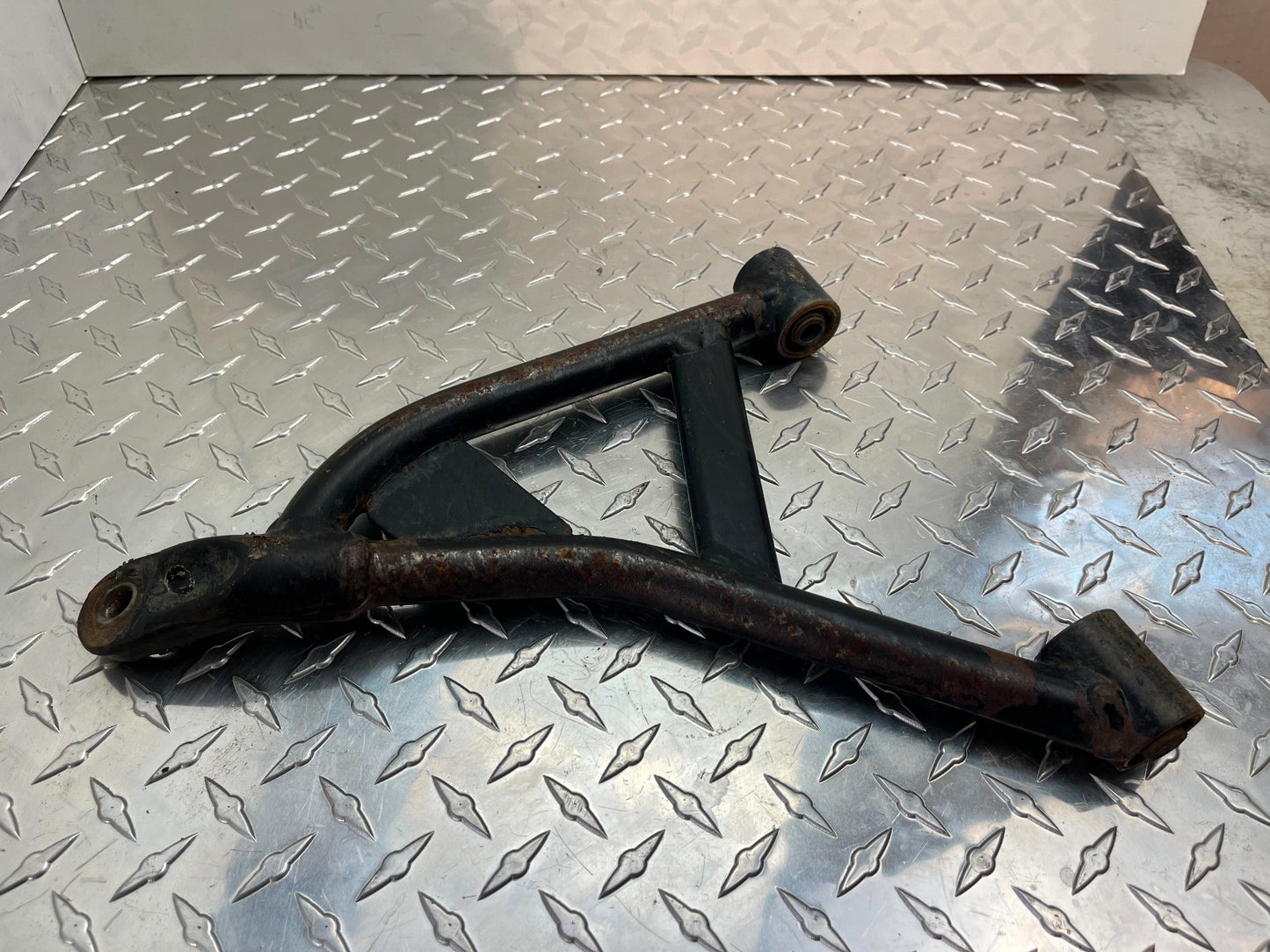 OEM HONDA TRX 300 FOURTRAX LEFT FRONT LOWER ARM ASSY PART# 51360-HM4-850