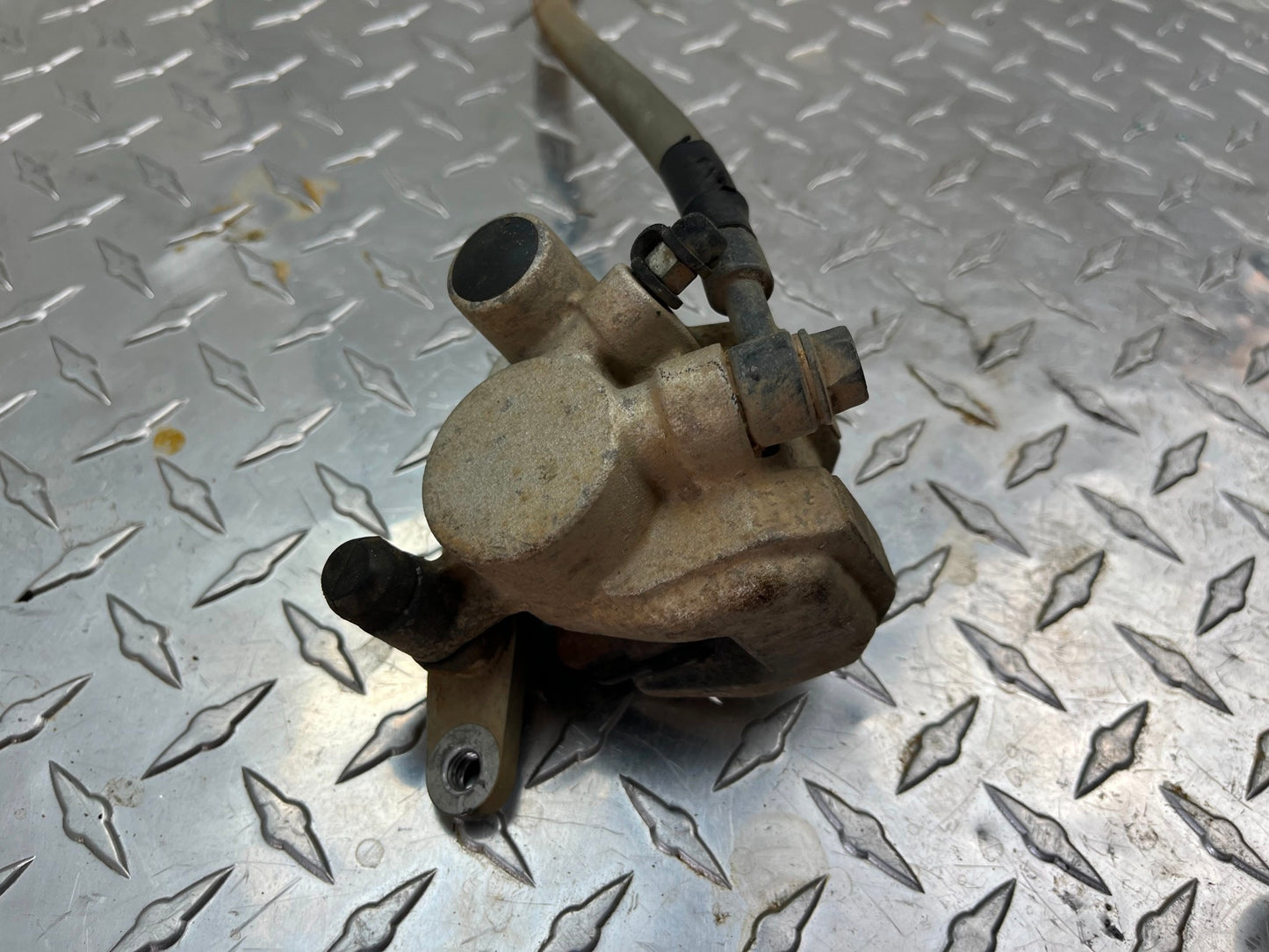OEM HONDA CRF150R FRONT BRAKE ASSY PART# 45150-KSE-006 & 45510-GBF-J01