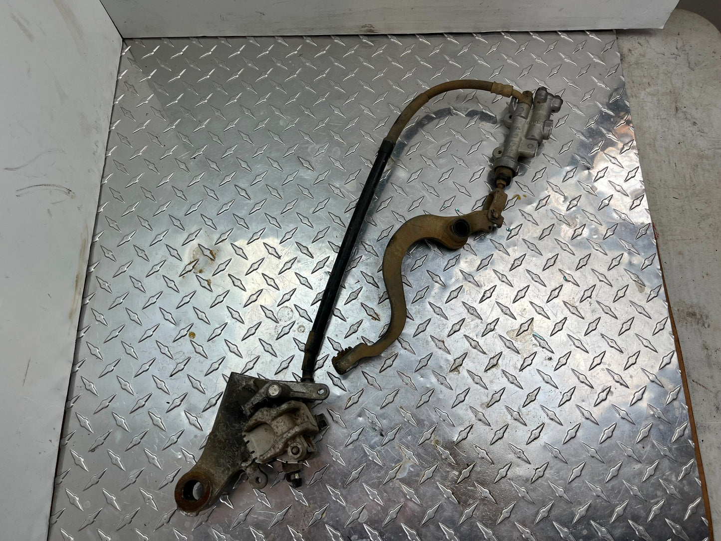 OEM HONDA CRF150R REAR BRAKE KIT PART# 43500-KSE-016 & 43150-KSE-006